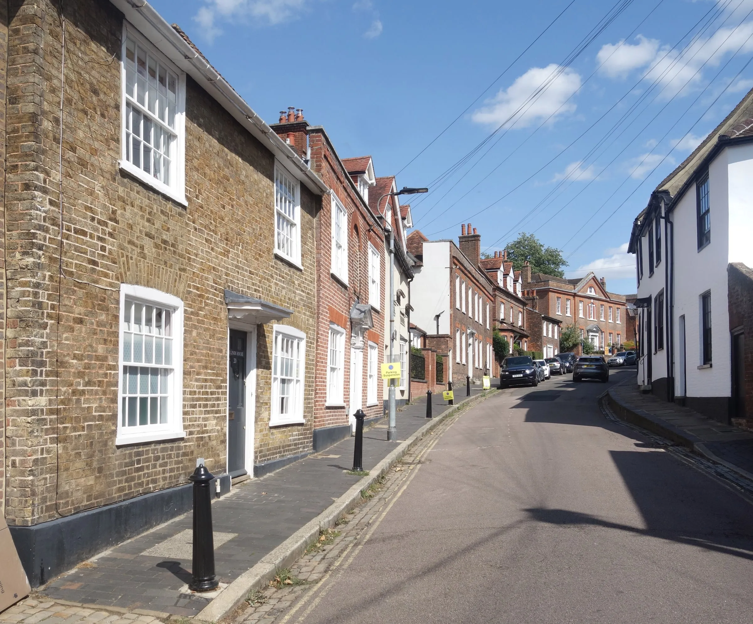Brick and rendered houses lining Fishpool Street in St Albans